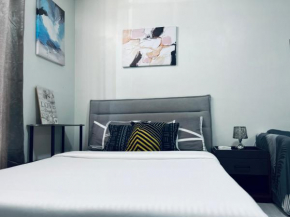 COZY STUDIO UNIT NEAR MACTAN AIRPORT FURNISH with WIFI, NETFLIX, POOL